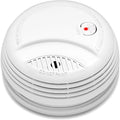 Wireless smoke detector for home with red power and silence button in white casing