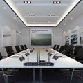 Wireless UHF microphone for meetings set up in a modern conference room