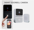 Wireless video doorbell with camera showing smart doorbell and smartphone video alert