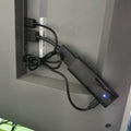 Xiaomi TV Stick with connected cables for streaming on compatible televisions