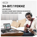 Musician using the XTUGA TEYUN Q24 sound card for high-quality recording on a laptop