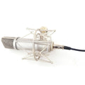XTUGA UX87 condenser microphone in silver with shock mount for studio recording and vocals