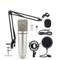 Complete set with XTUGA UX87 condenser microphone, adjustable stand, pop filter, and accessories