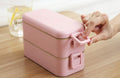 2 Layers Wheat Straw Lunch Box 800ml in pink with secure latch and ergonomic design for easy carrying