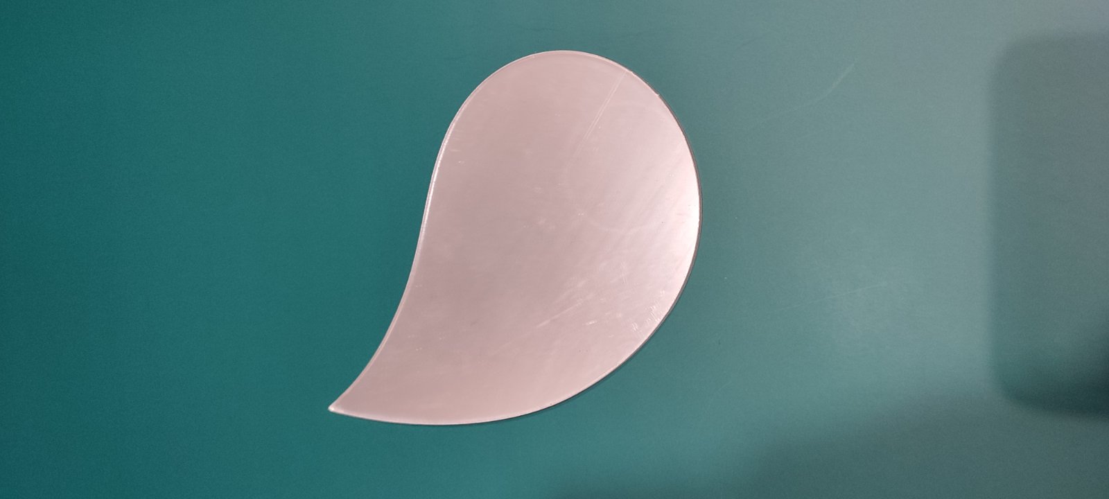 VMIDirect Acrylic Mirror Props in a unique teardrop shape for creative display and decoration