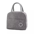 VMIDirect Bento Lunch Bag Insulated in gray fabric with a front pocket for easy storage