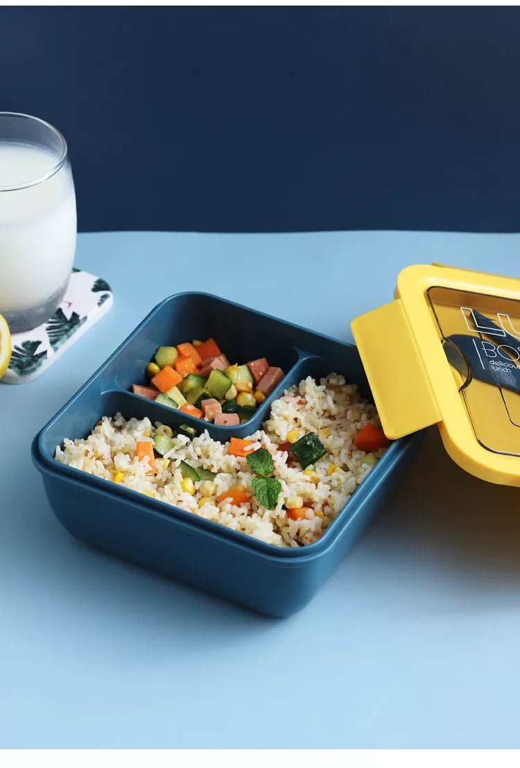 1100ml Plastic Bento Lunch Box with compartments for rice and vegetables, perfect for meals on the go