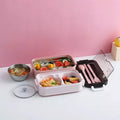 VMIDirect bento lunch box with compartments for fruits and pasta, including utensils and a bowl