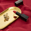 Cloth Photography Decoration Props featuring a gold tray and red lipstick on elegant satin fabric