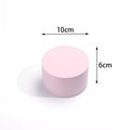 Pink cylinder prop for Cube Photography, measuring 10cm wide and 6cm tall for creative shoots