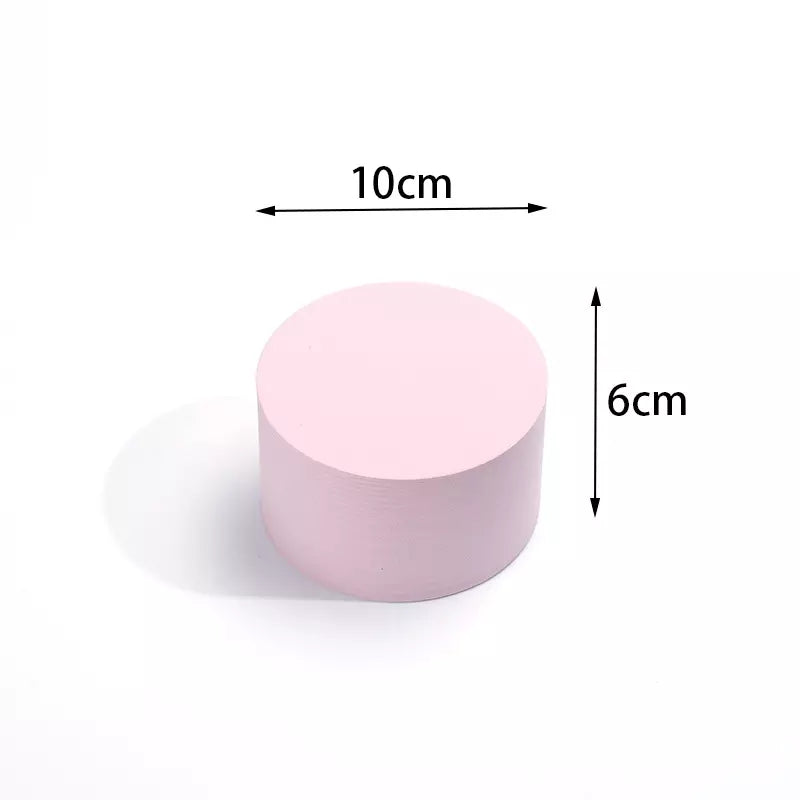Pink cylinder prop for Cube Photography, measuring 10cm wide and 6cm tall for creative shoots