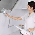 VMIDirect Handheld Home Mop Kit being used for cleaning kitchen surfaces effortlessly