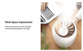 Smart Ultrasonic Humidifier enhancing work space atmosphere with mist near a laptop