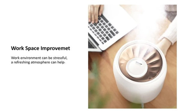 Smart Ultrasonic Humidifier enhancing work space atmosphere with mist near a laptop