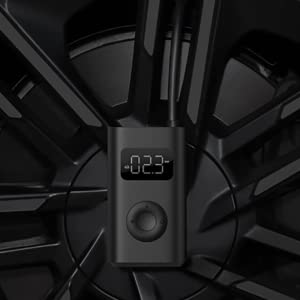 VMIDirect Electric Air Compressor Pump with Digital Pressure Gauge on a Wheel Rim