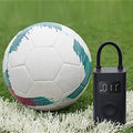 VMIDirect Electric Air Compressor Pump next to a soccer ball on grass for quick inflation
