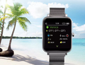 VMIDirect Watch Fitness Tracker displaying weather information by a tropical beach