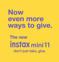 Fujifilm Instax Mini 11 Film Camera with vibrant yellow design and give-themed messaging