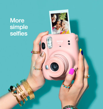Fujifilm Instax Mini Instant Camera in Pink with Selfie Feature and Instant Photo Print
