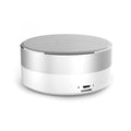 VMIDirect Bluetooth Speaker with sleek round design and USB charging port for portable music enjoyment