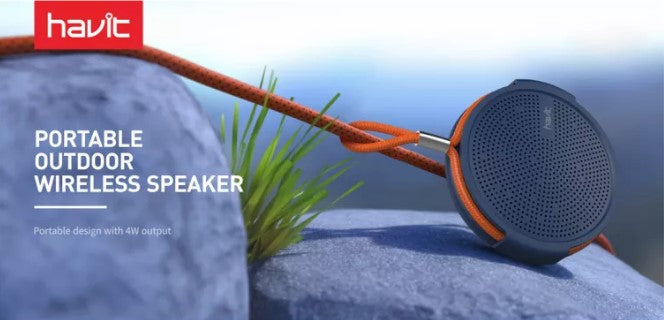 Havit portable outdoor wireless speaker with durable design and 4W output on rocky terrain
