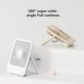 USB mini desktop fan in white and beige with adjustable angles for wide cooling
