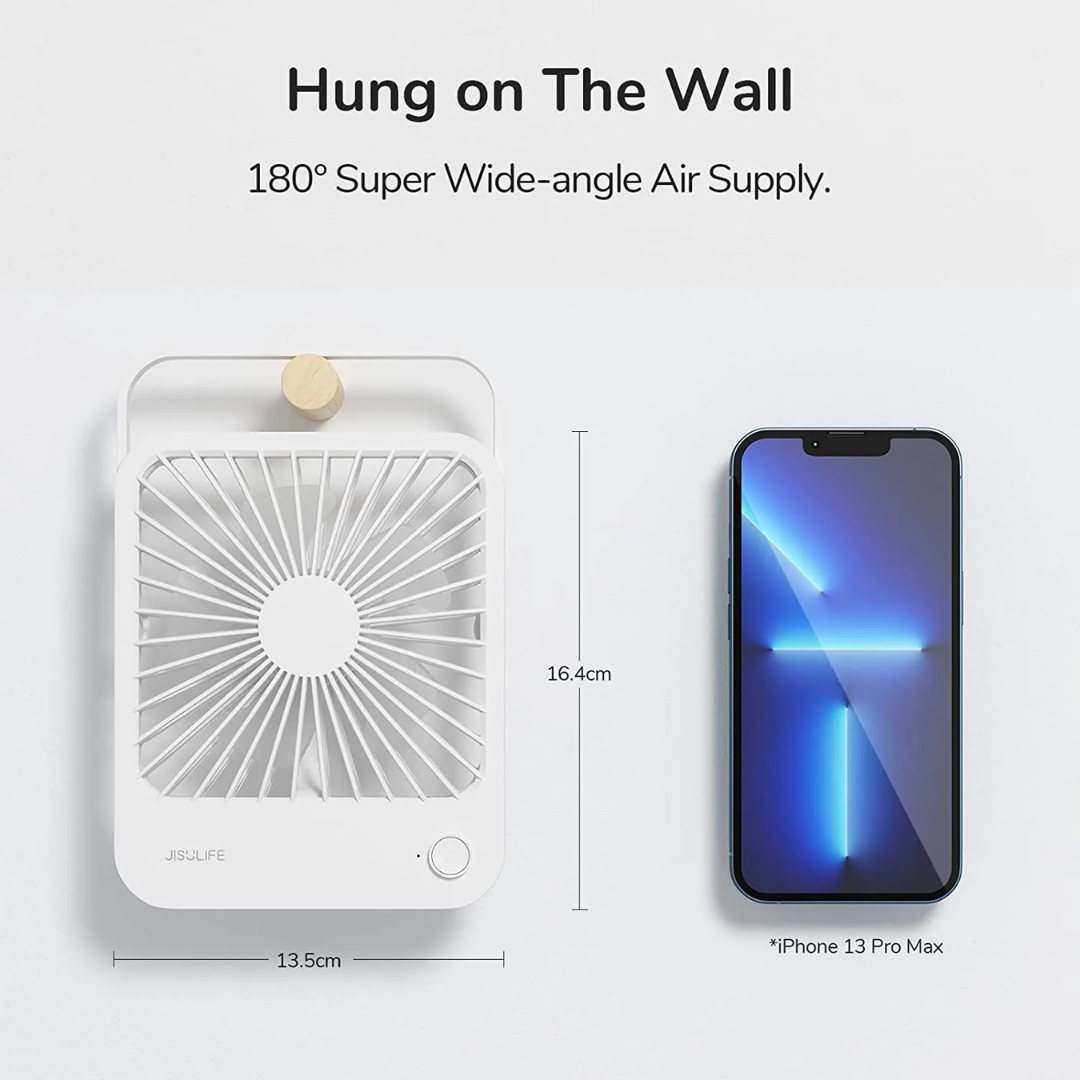 USB mini desktop fan in white with 180 degree wide-angle air supply, shown next to iPhone 13 Pro Max