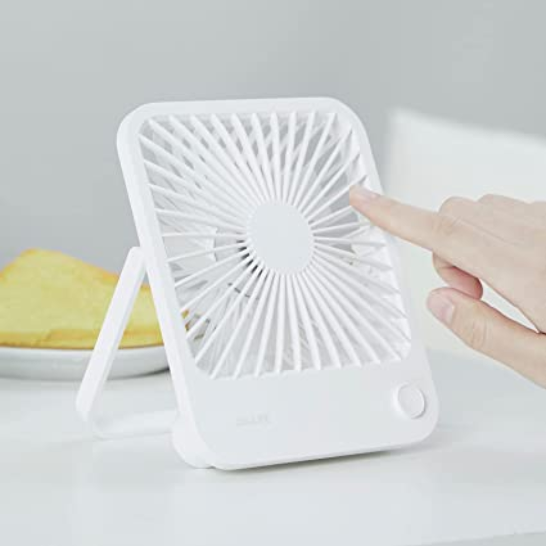 White USB mini desktop fan with compact design and touch control on a clean surface