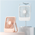 USB rechargeable desk fan in white and peach with compact, portable design