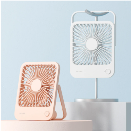 USB rechargeable desk fan in white and peach with compact, portable design