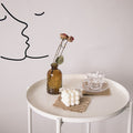 VMIDirect Linen Mat Photo Props on a white table with decorative items and artistic wall art