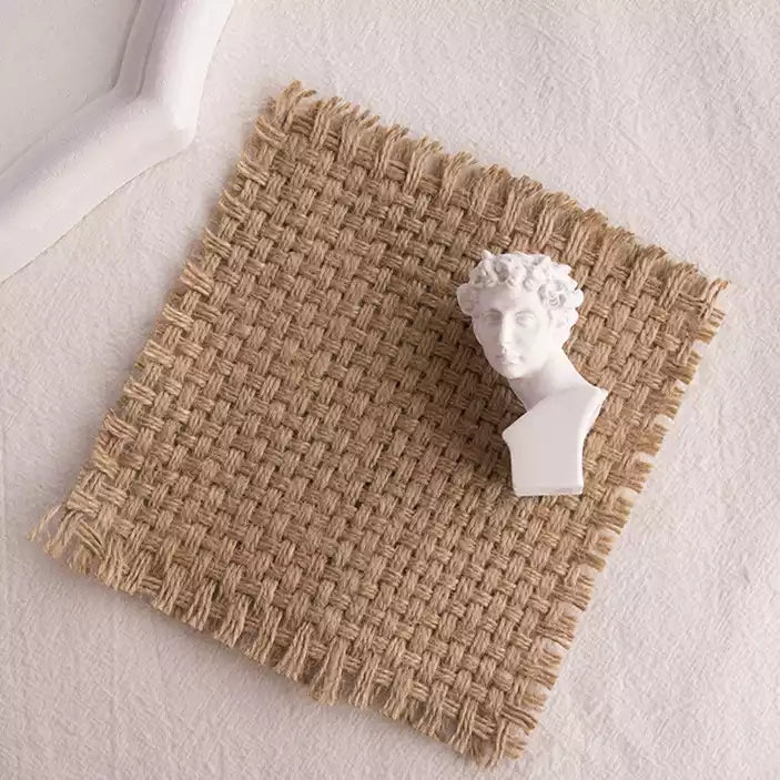 Linen Mat Photo Props with a White Bust on a Natural Textured Background for Photography Setup