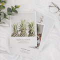 VMIDirect magazines card decoration featuring tropical plant designs and stylish layout