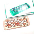 MOFII Candy M keyboard with lights in pastel pink and cream colors with round keys
