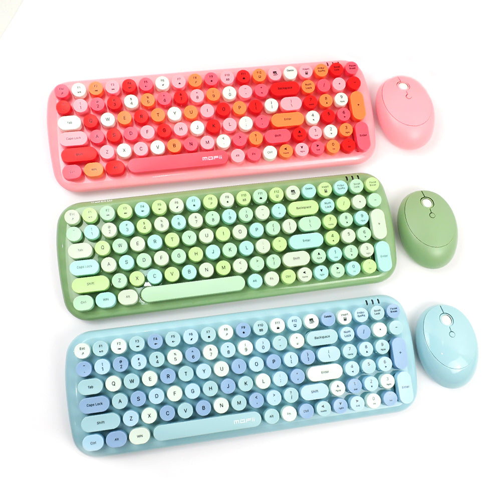 Three colorful Mofii Candy XR wireless keyboard and mouse combo sets in pink, green, and blue colors