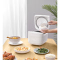 VMIDirect Multifunctional Food Cooker with rice and vegetable dishes ready to serve