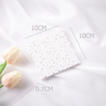 Natural Stone Props in white, measuring 10x10cm and 0.7cm thick, ideal for photography backgrounds