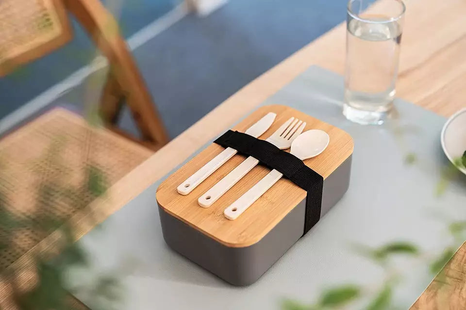 VMIDirect Portable Bento Lunch Box with utensils secured in a sleek design on a table