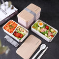 Portable Plastic Bento Lunch Box with compartments for pasta, salad, and snacks, featuring a stylish design