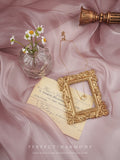 Smooth Silk Mercerized Photography featuring delicate flowers, a golden frame, and elegant styling