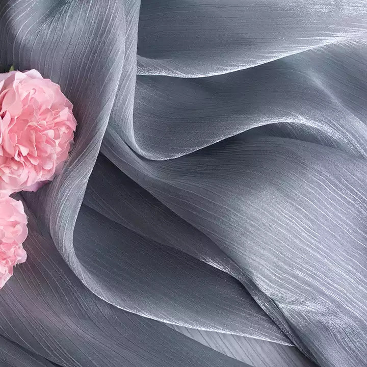 Smooth Silk Mercerized Photography Backdrop in Soft Peach with Floral Arrangement