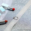 VMIDirect Sparkling Sky Background with lipsticks and decorative elements for stylish product photography