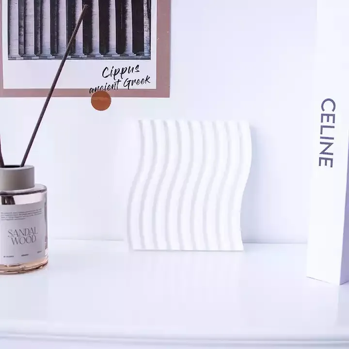 Wave Plaster Cutting Board Decoration displayed on a stylish tabletop with candles and decor items