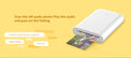 VMIDirect Wireless Mobile Printer in white printing a photo with colorful background and text