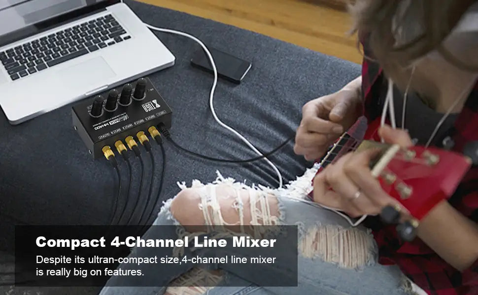XTUGA MH400 micro sound mixer VMIDirect on couch connected to laptop with multiple cables while musician plays ukulele